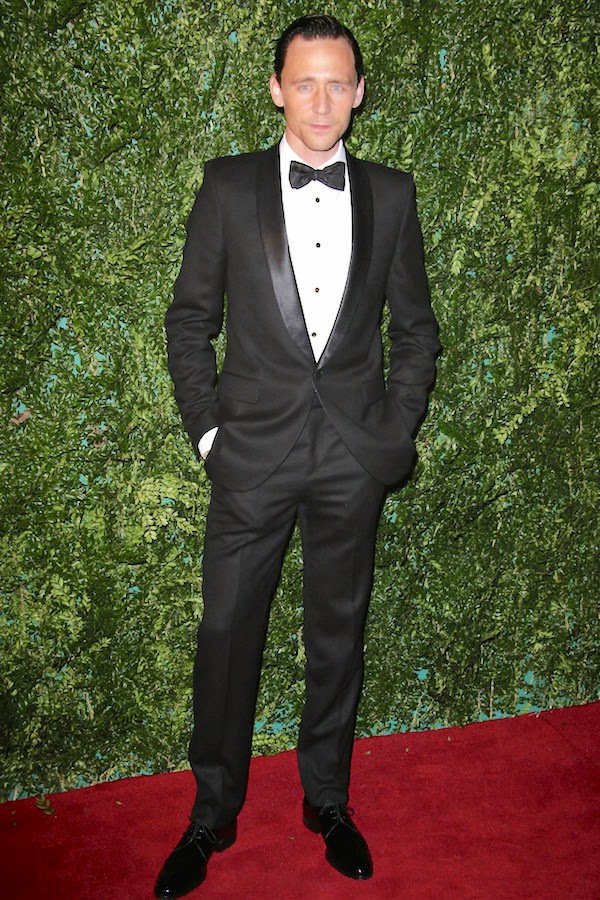 Tom Hiddleston wears Alexander McQueen tuxedo and Mr Hare shoes to 60th Evening Standard Theatre Awards at the London Palladium November 30th 2014