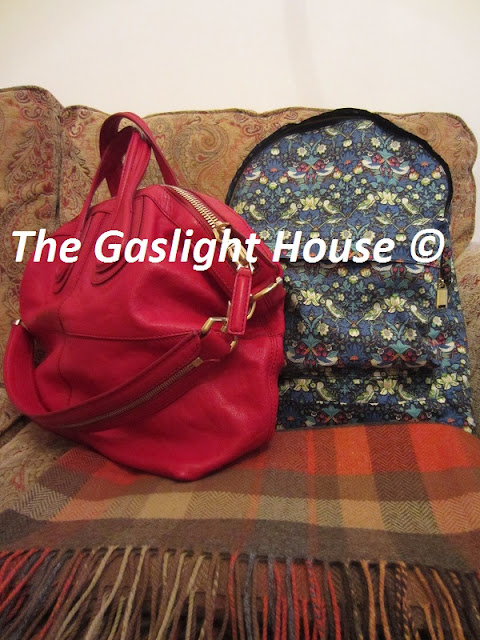 Strawberry Thief Liberty Mi-Pac flanked by Givenchy Nightingale and Avoca lambswool throw Strawberry Thief Liberty Mi-Pac flanked by Givenchy Nightingale and Avoca lambswool throw