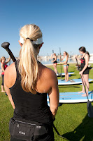 Instructor teaching land drills in SUP- Basic Skills