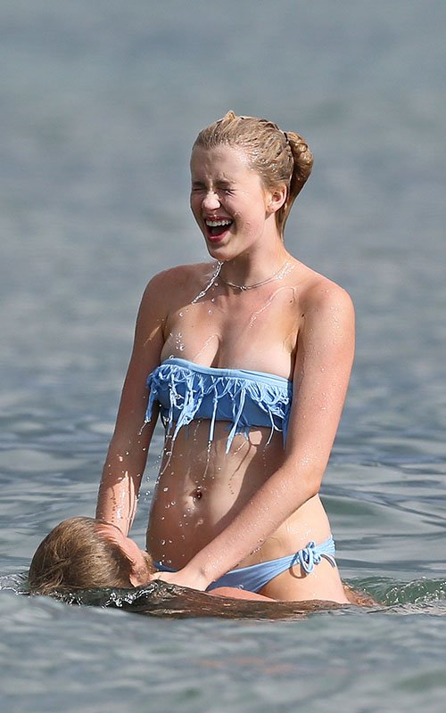 Ireland Baldwin wearing a blue bikini