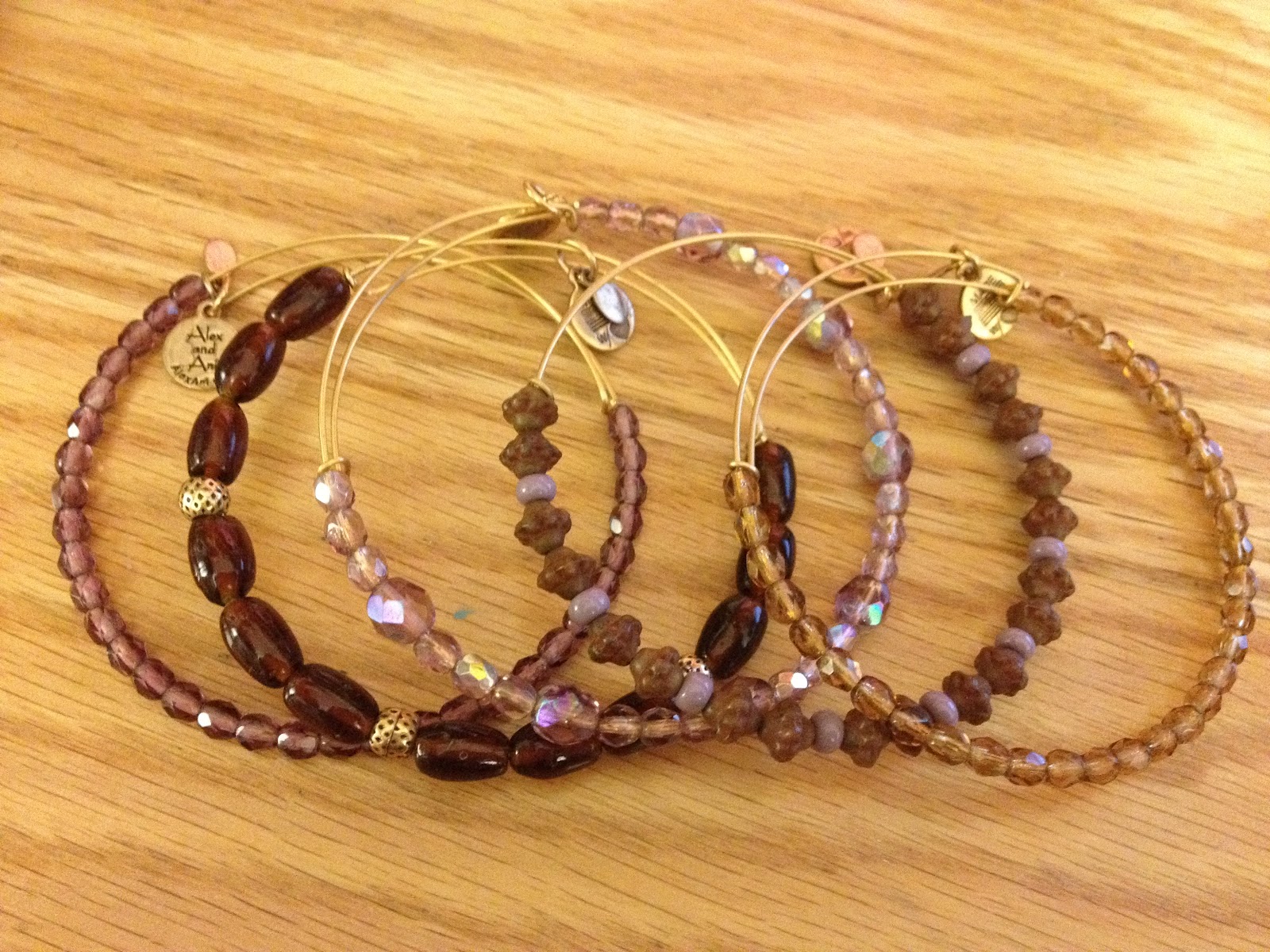MiSSGLAMOURGiiRL Golden Alex and Ani Bracelets!