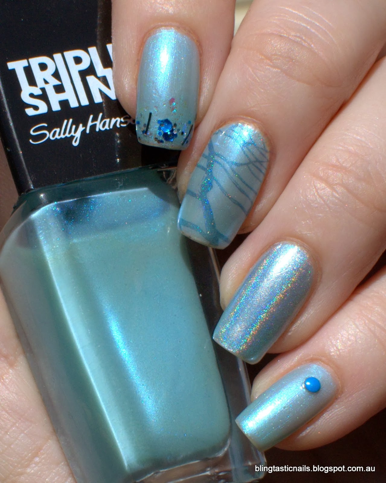 Sally Hansen Pool party with glitter gradient stamping and studs