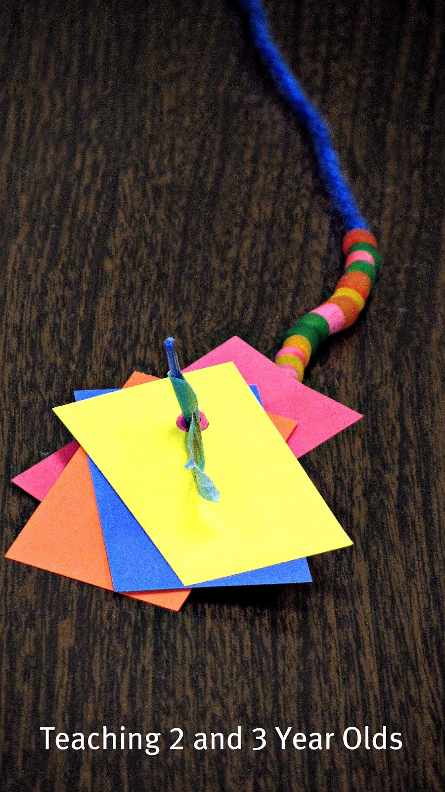 Teaching 2 and 3 Year Olds Rainbow Threading Necklaces