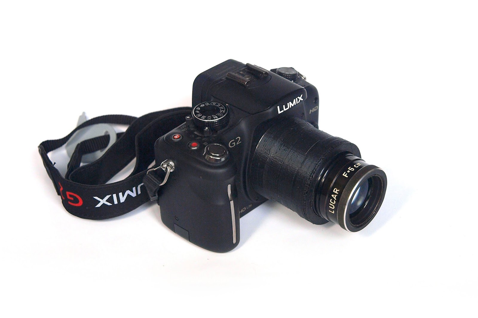 ŁZK Lucar 50/1.6 and 3D-printed adapter for MFT - infinity protrusion. ŁZK Lucar 50/1.6 and 3D-printed adapter for MFT - infinity protrusion.