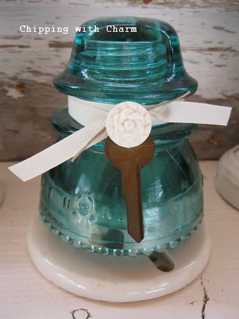 Chipping with Charm: Aqua Glass Insulator Trees...http://chippingwithcharm.blogspot.com/