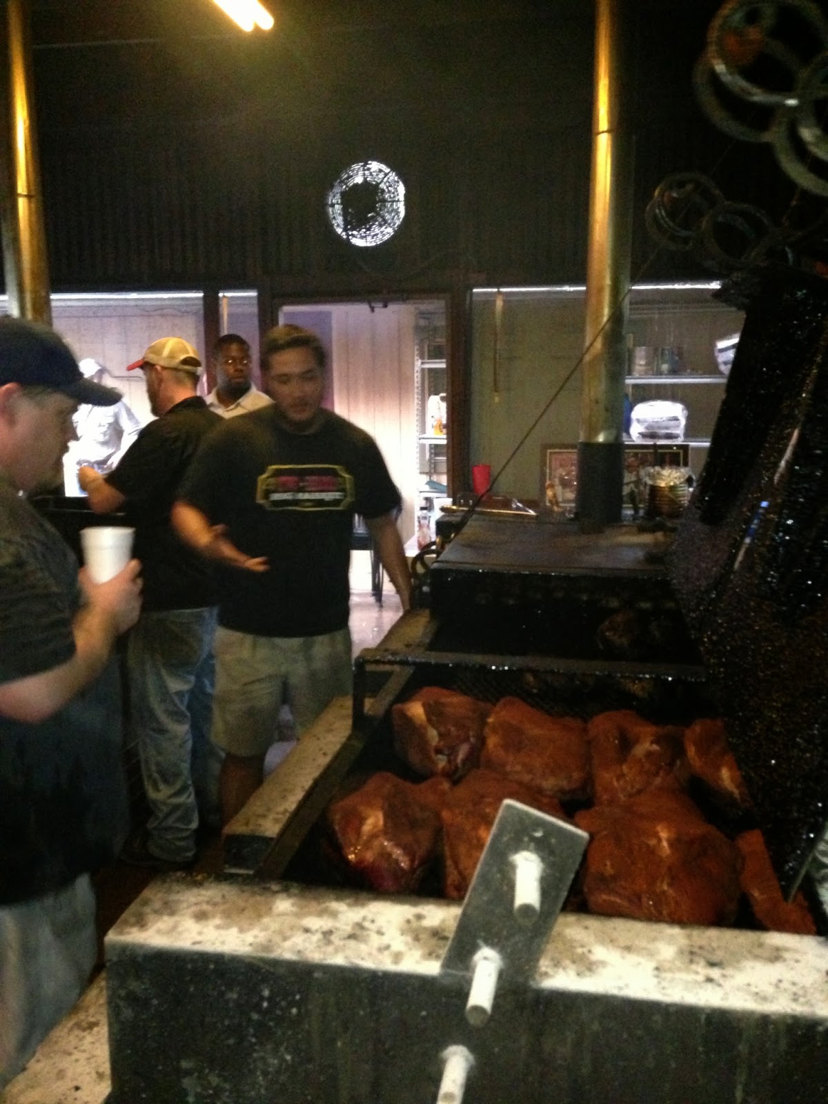 Man Up Tales of Texas BBQ™ The pit at Two Bros. BBQ Market (San