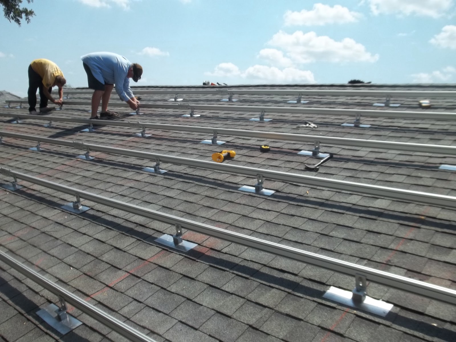 J. K. Behan Roofing Roof Mounting for a Photovoltaic Solar Panel