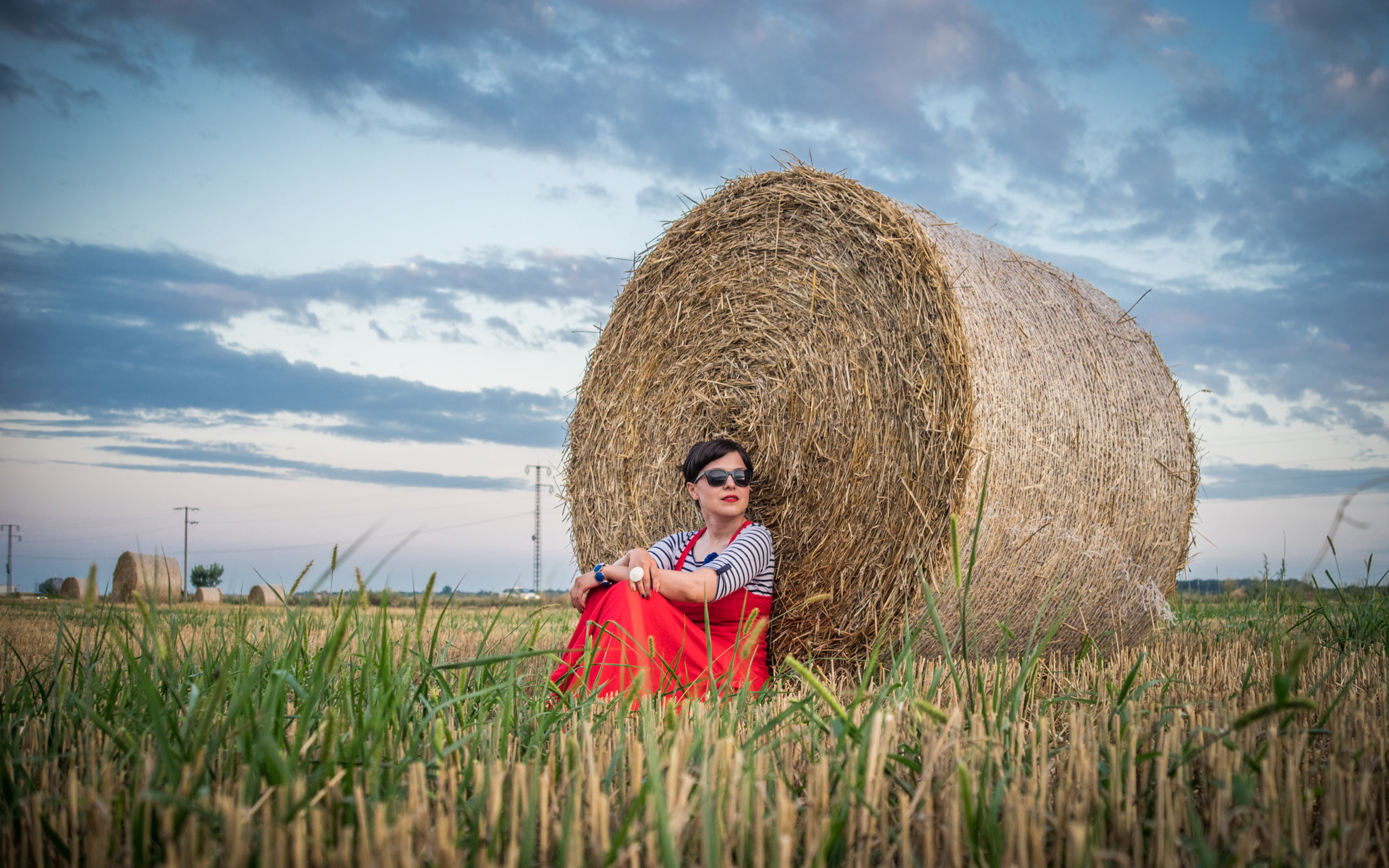 maxi red dress striped top stripes pimkie black flats cardigan hay bales photo shooting  black maxi bag brasov trip mountains 