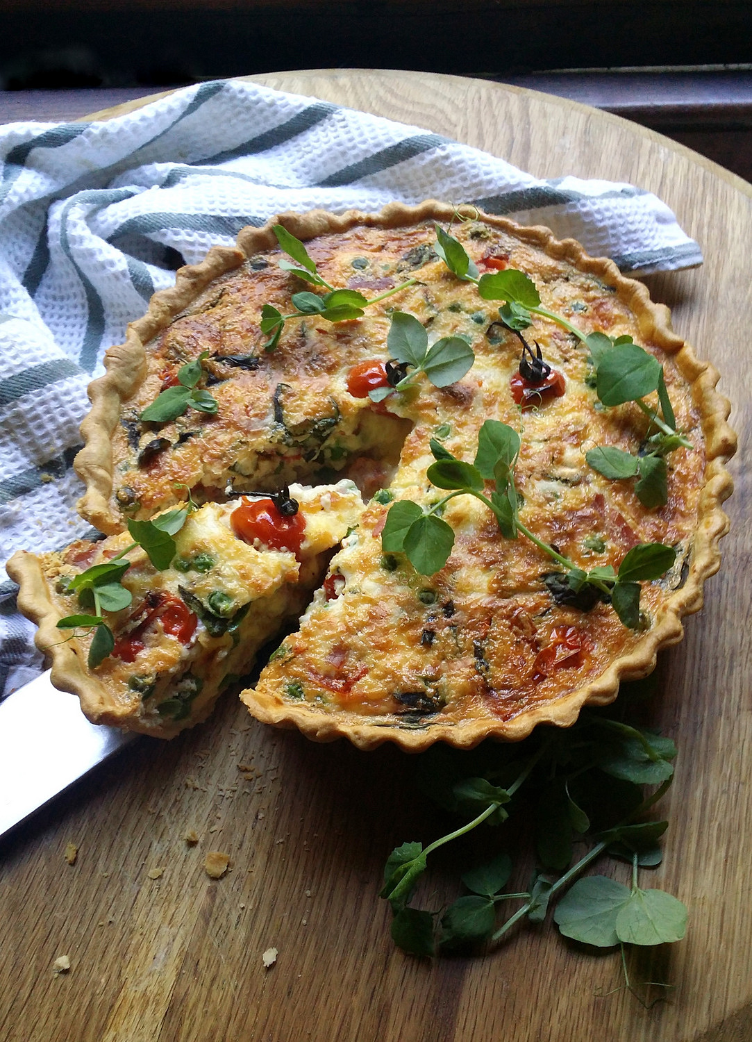 DeepDish Quiche with Blistered Tomatoes, Peas, Ham, Basil & Mozzarella