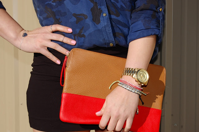 Zara camo blouse, black mini skirt, Topshop necklace, Gap two-tone clutch and Topshop heels.