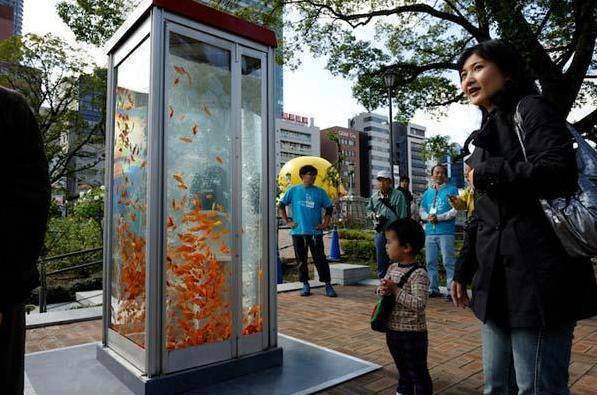 Public phones are outdated due to cellular phones so the phone booths were converted to Aquariums in Osaka, Japan.