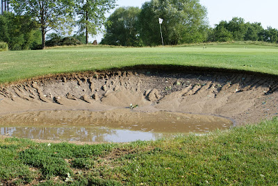 Golf Course sand trap bunker washed out after thunderstorm