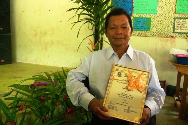 Katekis Petrus Idol Diang, 61 merupakan katekis pertama di Kg. Lumou sejak tahun 1973