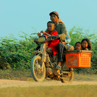 A family on one motorbike