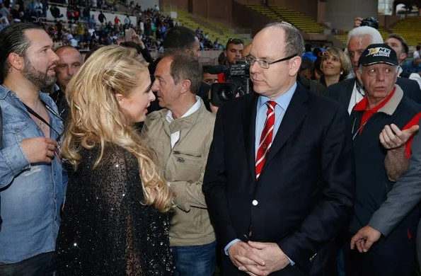 Prince Albert II of Monaco chats to Paris Hilton during the 22nd World Stars football match at the Stade Louis II in Monaco