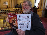 John reading Chariots of Fire program