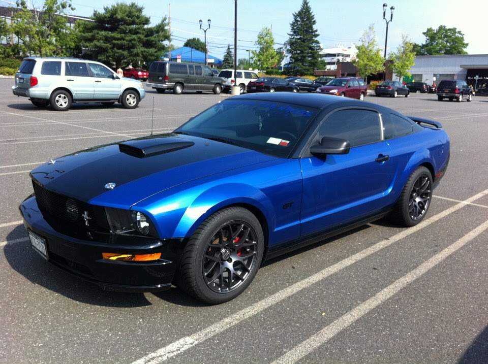 K Custom Car Wraps Mustang GT Wrapped in Hexis metallic blue with 3M carbon fiber accents
