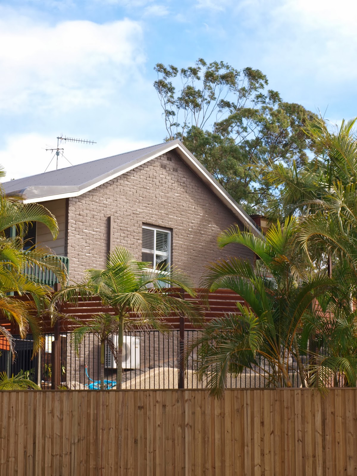 Painting the exterior brick walls of our home Glamour Coastal Living