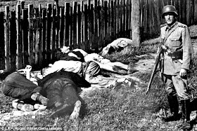 German soldier with dead Russian civilians