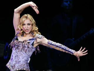 http://1.bp.blogspot.com/-eu3bAzjPSXI/TsdhjH5QWfI/AAAAAAAAACA/JT8scMlpV00/s320/194410__madonna_1292257374.jpg