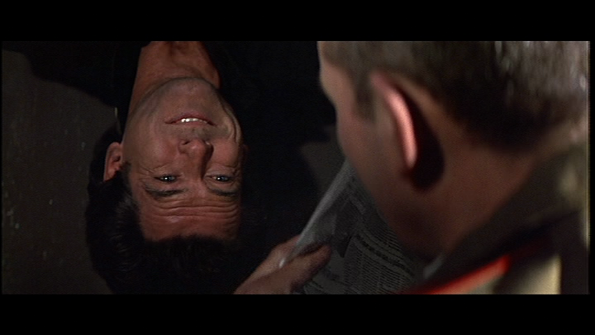 GoldenEye-James-Bond-Pierce-Brosnan-upside-down.png