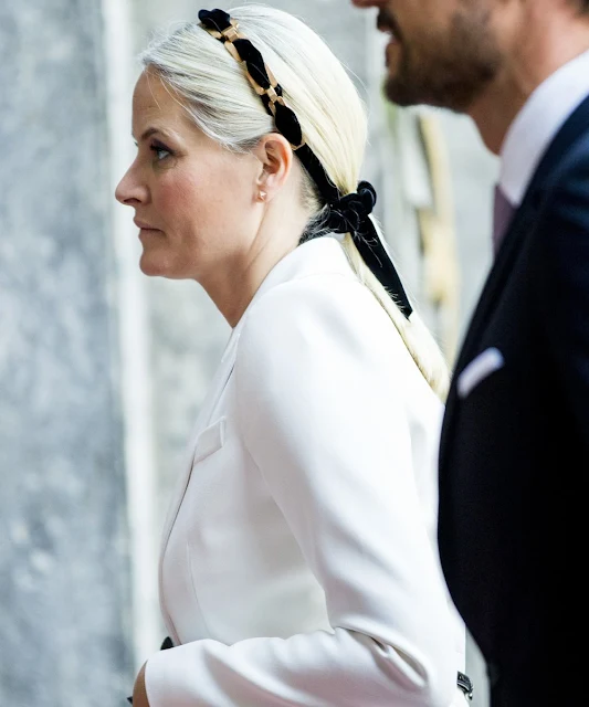 Prince Haakon and his wife Crown Princess Mette-Marit of Norway attend for the Peace Prize awarding ceremony