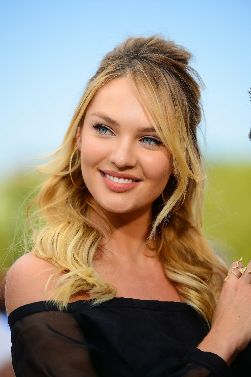 hot mess in a walmart dress: Candice Swanepoel visits 'Extra' at