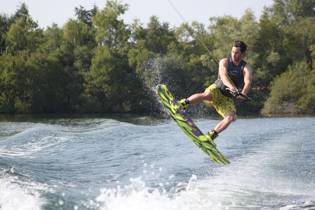 Guy pulls off an awesome move the right side of the lake