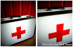 Red cross inspired vintage suitcase, by Behind the Red Door, via I Love That Junk