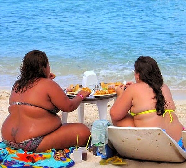 Grotesquely obese woman in bikini picture