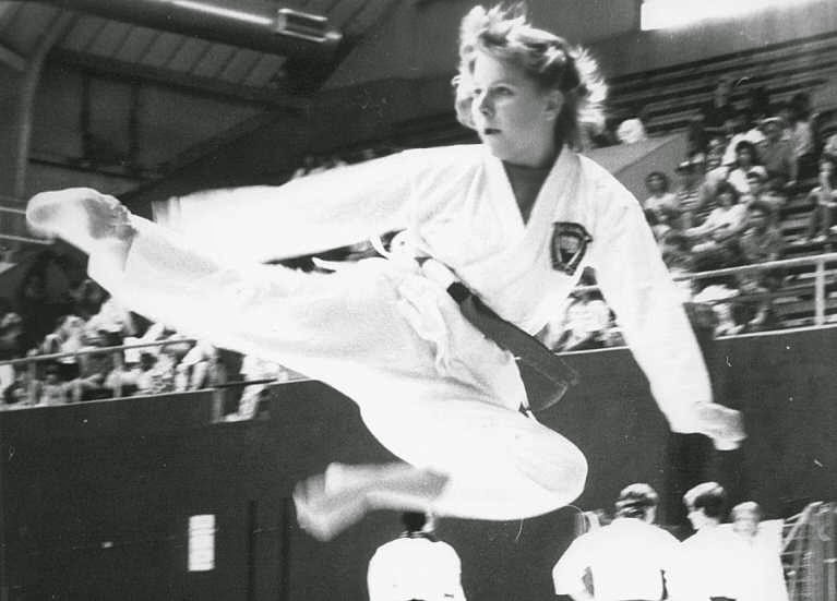 Martial Arts Instructor Martial arts instructor doing a flying kick