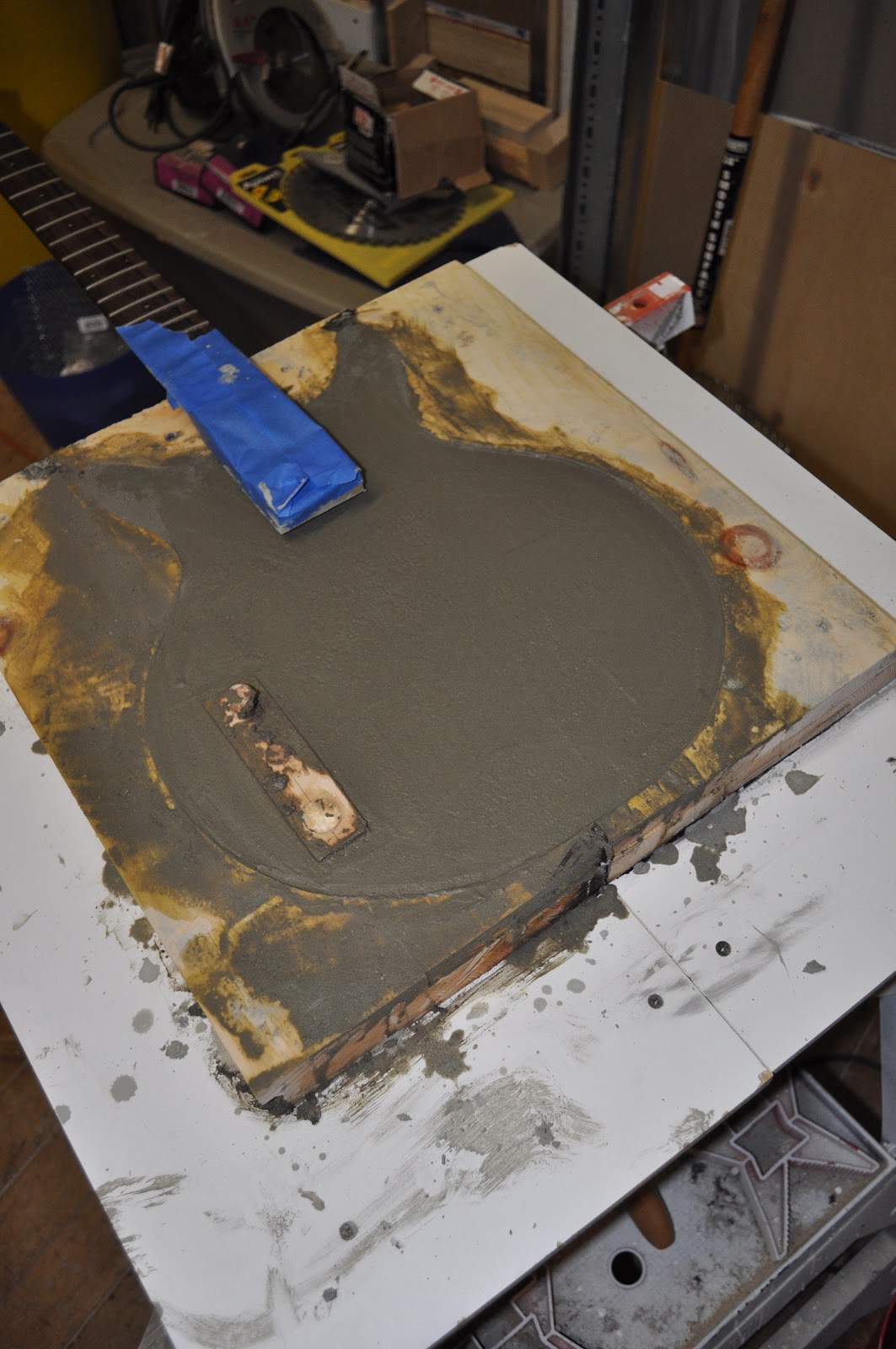 The Guitar Garage Concrete Bass Prototype What is heavier than metal