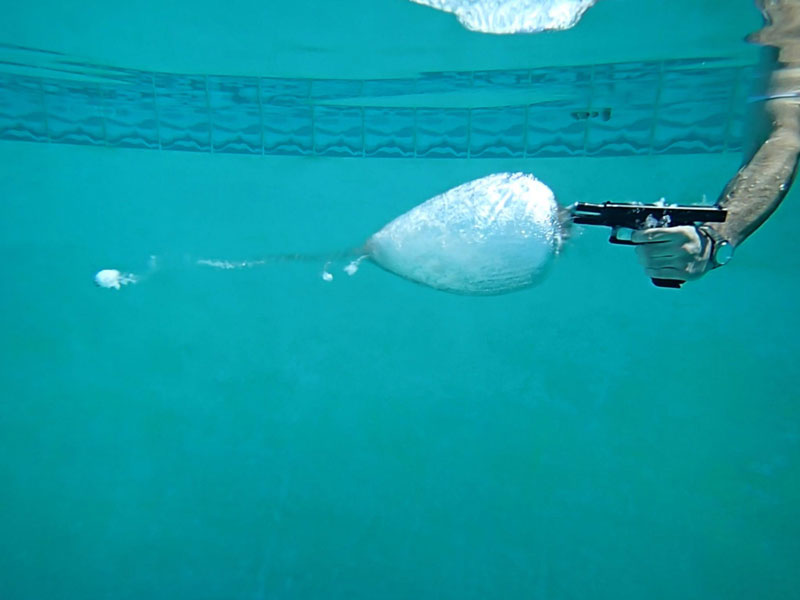 This is What Happens When you Shoot a Gun Underwater! Round the 