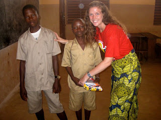 Emily with community members in Benin
