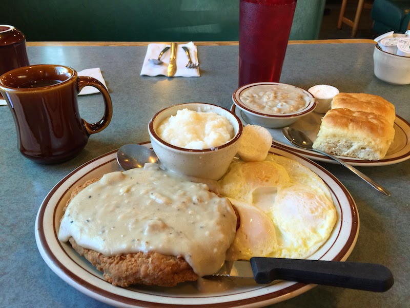 Country fried steak, eggs, grits, biscuits, and gravy at Omar's Hi-Way Chef in Tucson