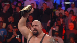 The Big show waives his WWE Heavy weight championship belt