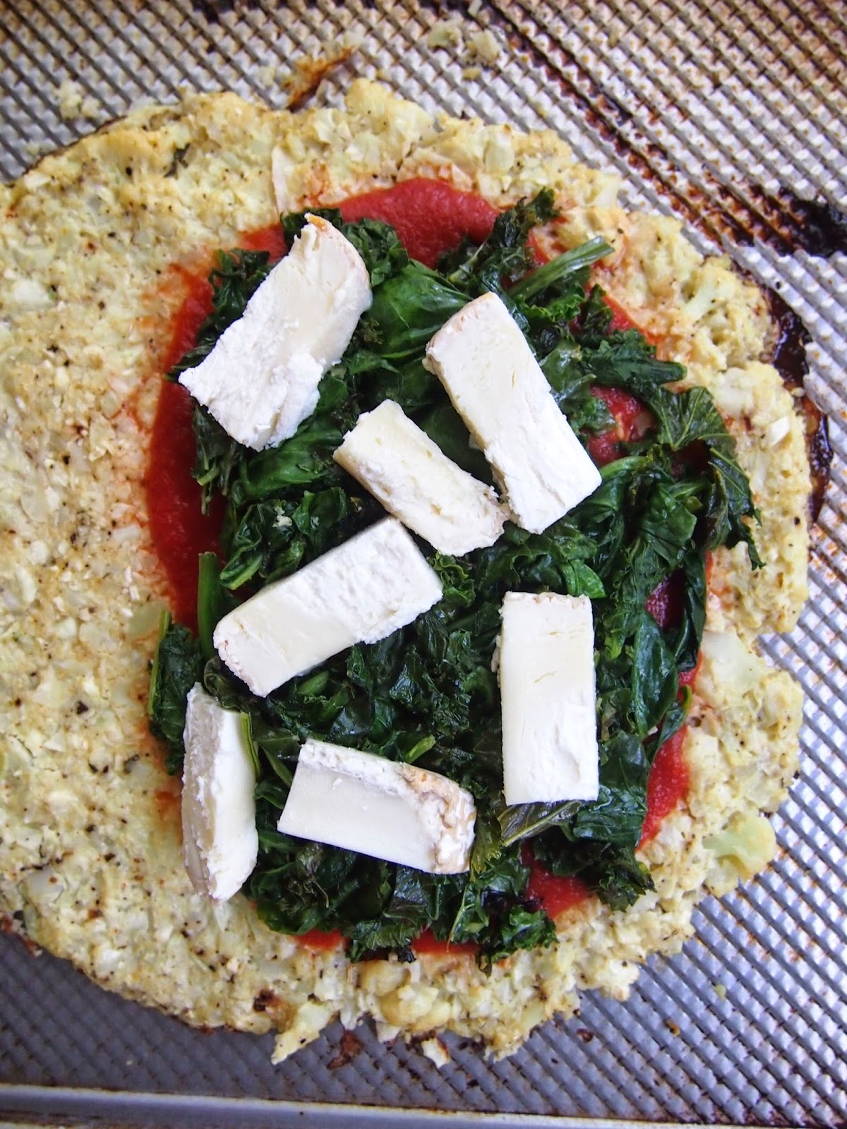 An Avocado A Day Cauliflower Crust Calzone with Greens & Brie