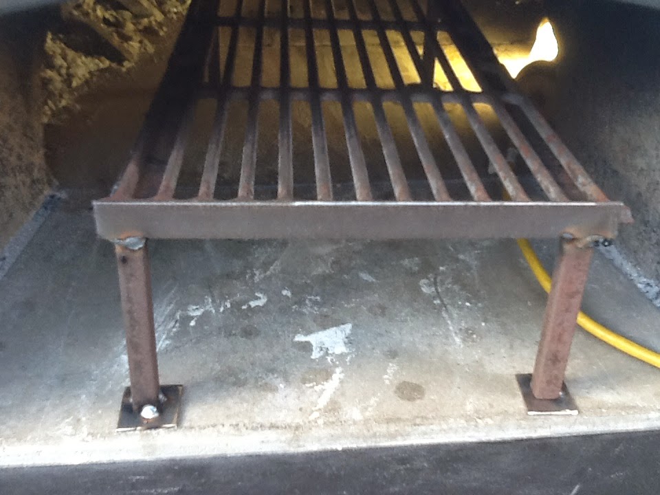 Flour, water, yeast, and steel er cast iron grate holder for pizza oven