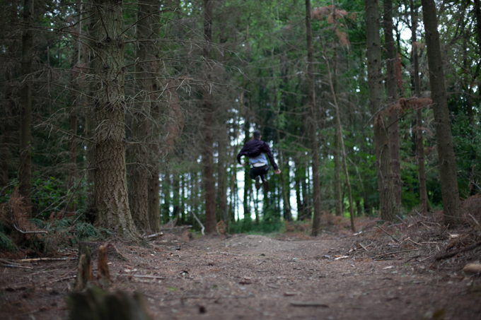 girl and guy in the forest at twilight