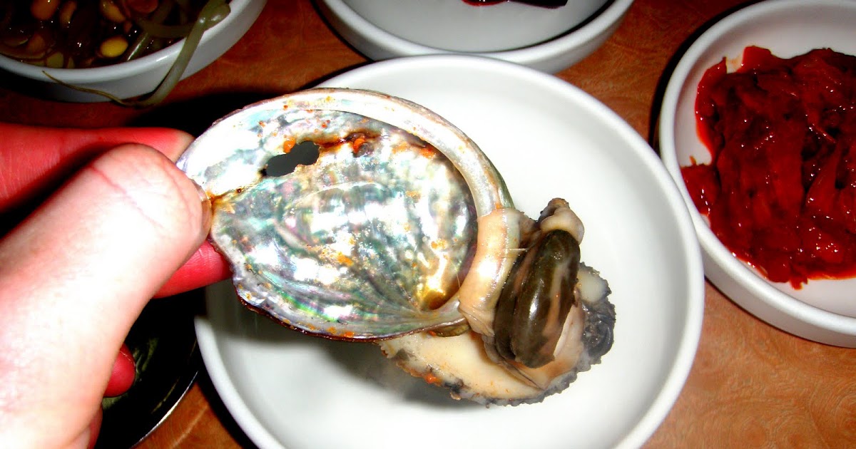Seoul Food Girl eating abalone on Jeju Island Gone Seoul Searching