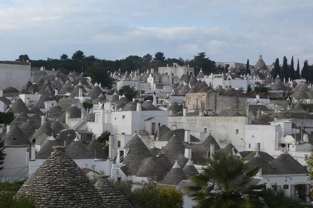Alberobello a Unique Italian Village Alberobello, the city of drystone dwellings known as trulli , is an exceptional example of vernacular architecture. It is one of the best preserved and most homogeneous urban areas of this type in Europe. Its special features, and the fact that the buildings are still occupied, make it unique. It also represents a remarkable survival of prehistoric building techniques.