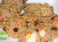 embutito a popular steam meat roll recipe during special filipino occasion,usually served with other recipe such as spaghetti and morcon