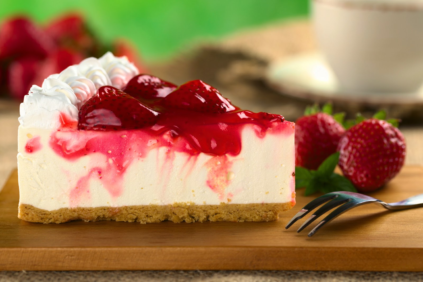 Cheescake Con Salsa De Fresa.
