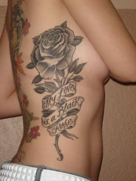 Now this black rose tattoo I do love plus the lil verse My love is a 