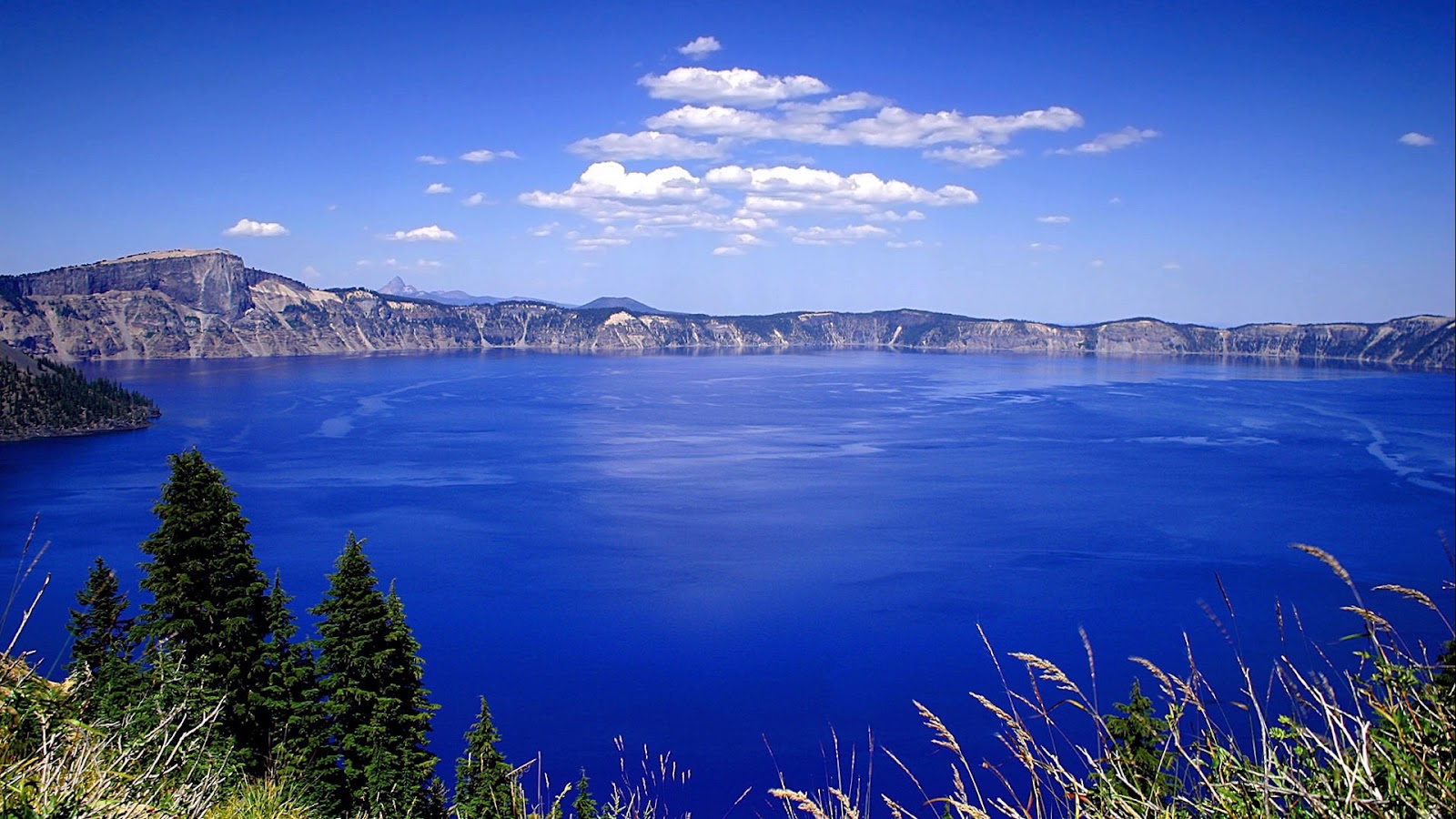 http://1.bp.blogspot.com/-gJQWjLtmXng/UEhWyvWefsI/AAAAAAAAA18/3VmlsX5Yhlw/s1600/beautiful-blue-lake-between-mountain-full-HD-nature-background-wallpaper-for-laptop-widescreen.jpg