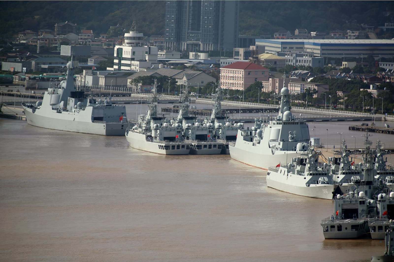 Armée Chinoise / People's Liberation Army (PLA) - Page 9 Warships+At+Chinese+Zhoushan+Naval+Base+type+054+ab+c+d+e+f+type+052+55+56+pla+navy+export+frigate+destroyer+missile+Type+052C+Guided+Missile+Destroyers%252C+Type+054A+Jiangkai+II+Guided+Missile+Frigates+and+Type+056+Guided+Corve