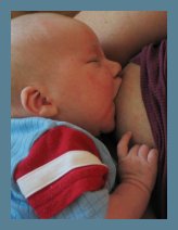 Women+breastfeeding+baby
