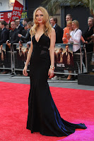 Heather Graham looks glamorous in a black gown on the red carpet