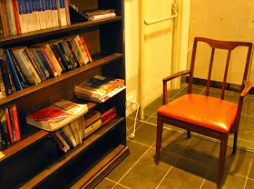Vintage chair in the corner of The Little Library in Melbourne Central.