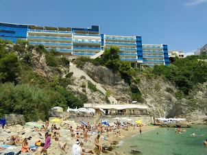 The public free pebble beach adjacent to plush 5-Star "Rixos Libertos" hotel